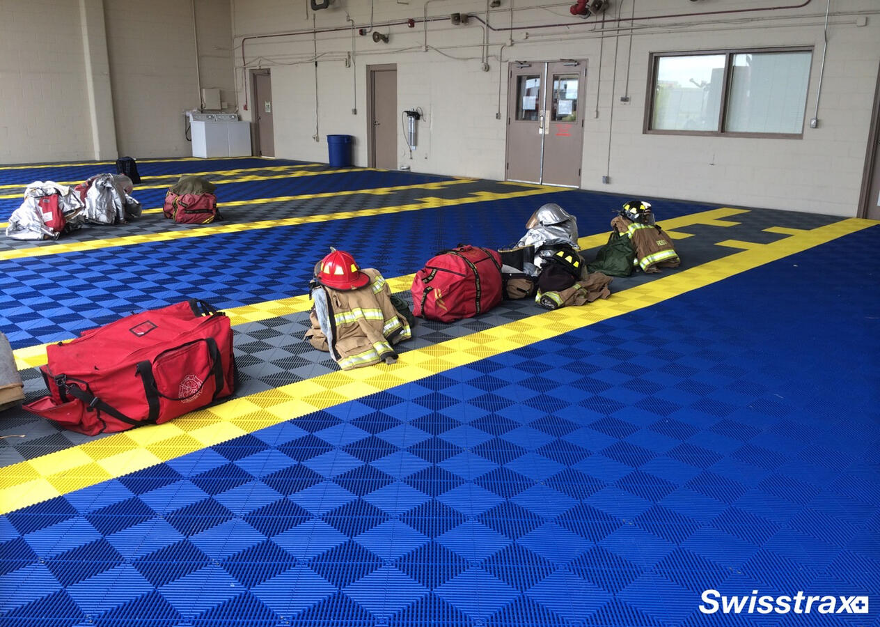Blue, red and yellow Swisstrax fire station floor Blue, red and yellow Swisstrax fire station floor